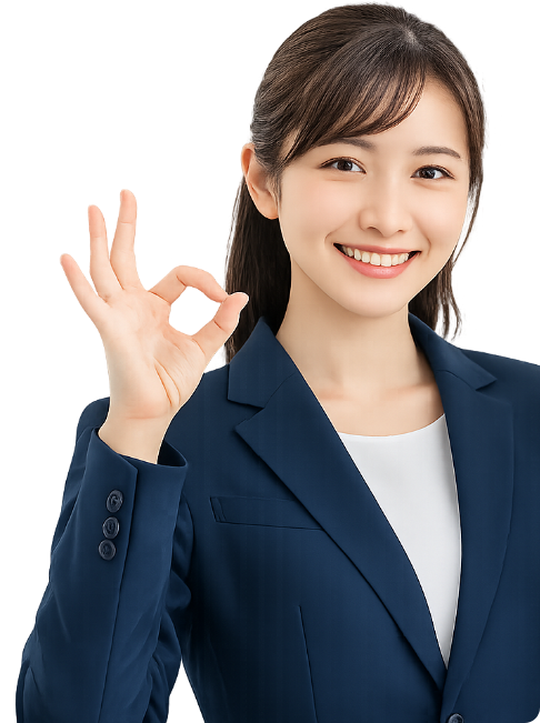 スーツ姿でOKポーズをする女性スタッフの画像
